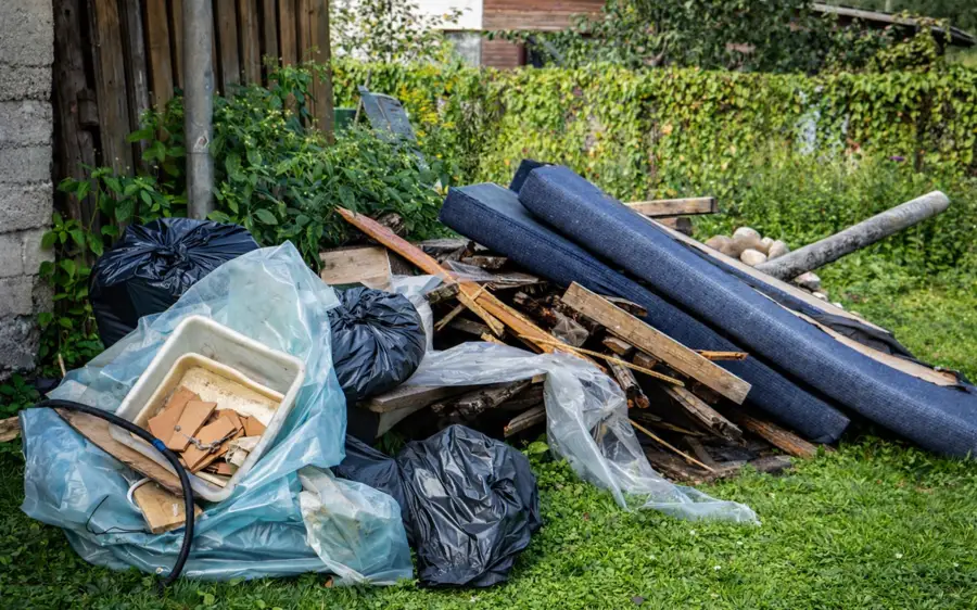 A pile of furniture and household junk ready for pickup